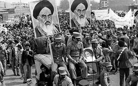 Army Demonstration...The Iranian Islamic Republic Army demonstrates in solidarity with people in the street during the Iranian revolution. They are carrying posters of the Ayatollah Khomeini, the Iranian religious and political leader.   (Photo by Keystone/Getty Images)