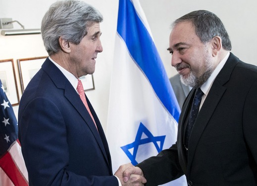Lieberman greets Kerry ahead of their meeting at the David Citadel hotel in Jerusalem