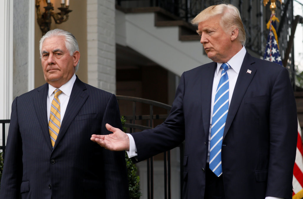 U.S. President Donald Trump (C) defers to Secretary of State Rex Tillerson (L) to answer a reporter's question after their meeting, also including U.S. Ambassador to the United Nations Nikki Haley (R), at Trump's golf estate in Bedminster, New Jersey U.S. August 11, 2017. REUTERS/Jonathan Ernst